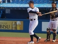 ノックを打つ溝口智成監督